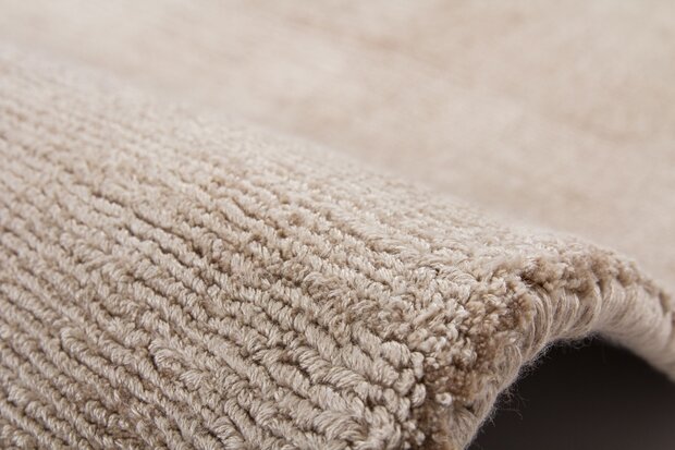 Effen exclusief vloerkleed beige Dhakar